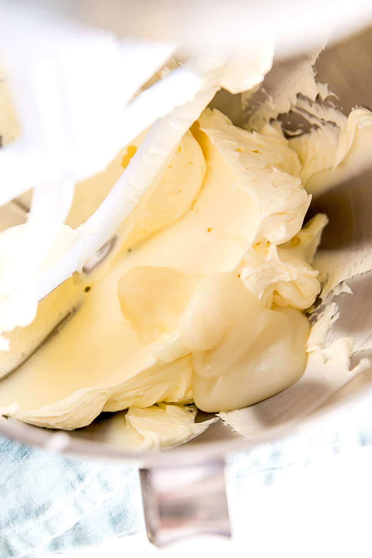 Ermine Frosting (also known as flour buttercream or heritage frosting) is an easy and delicious buttercream made with flour, sugar, milk, and butter. | livforcake.com Adding the flour mixture (roux) to the creamed butter 1 Tbsp at a time.