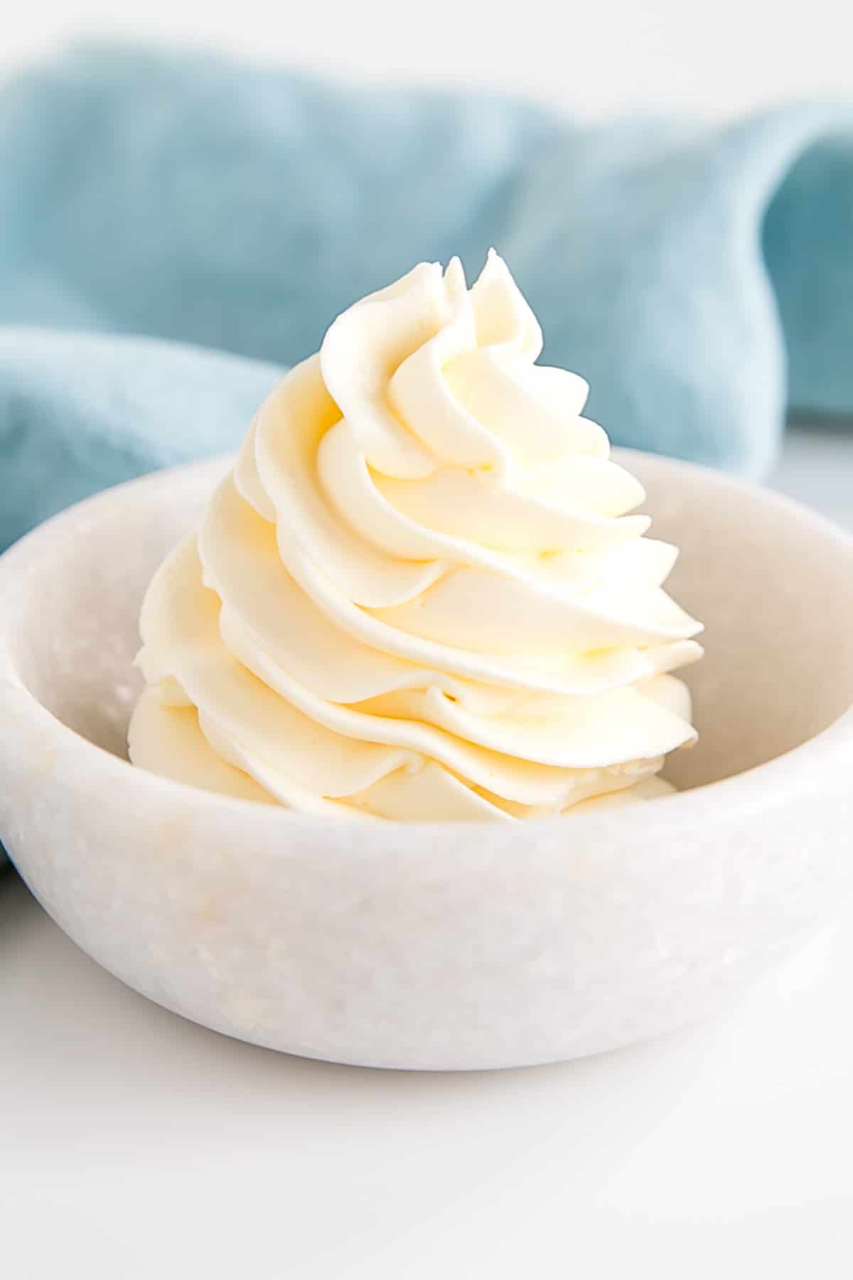 This custard-based German buttercream is made with just a few simple ingredients. Perfect for those who like a rich and silky frosting that isn't too sweet! | livforcake.com Swirl of German buttercream