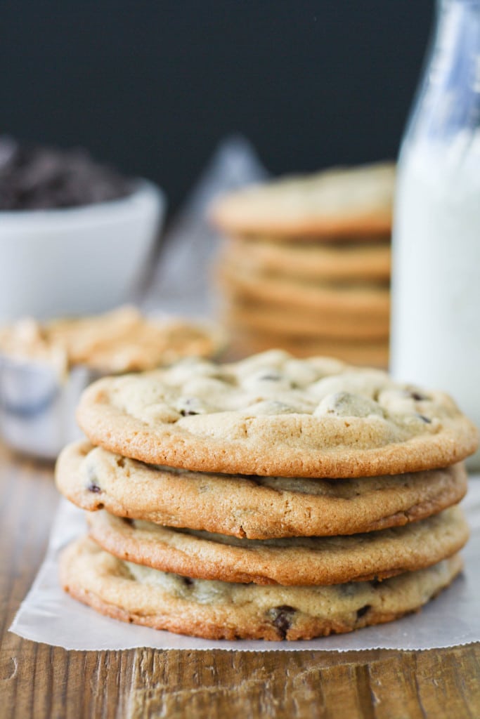 Peanut Butter Chocolate Chip Cookies! These chewy cookies are sweet, salty, and delicious. | livforcake.com Close up of a stack of cookies