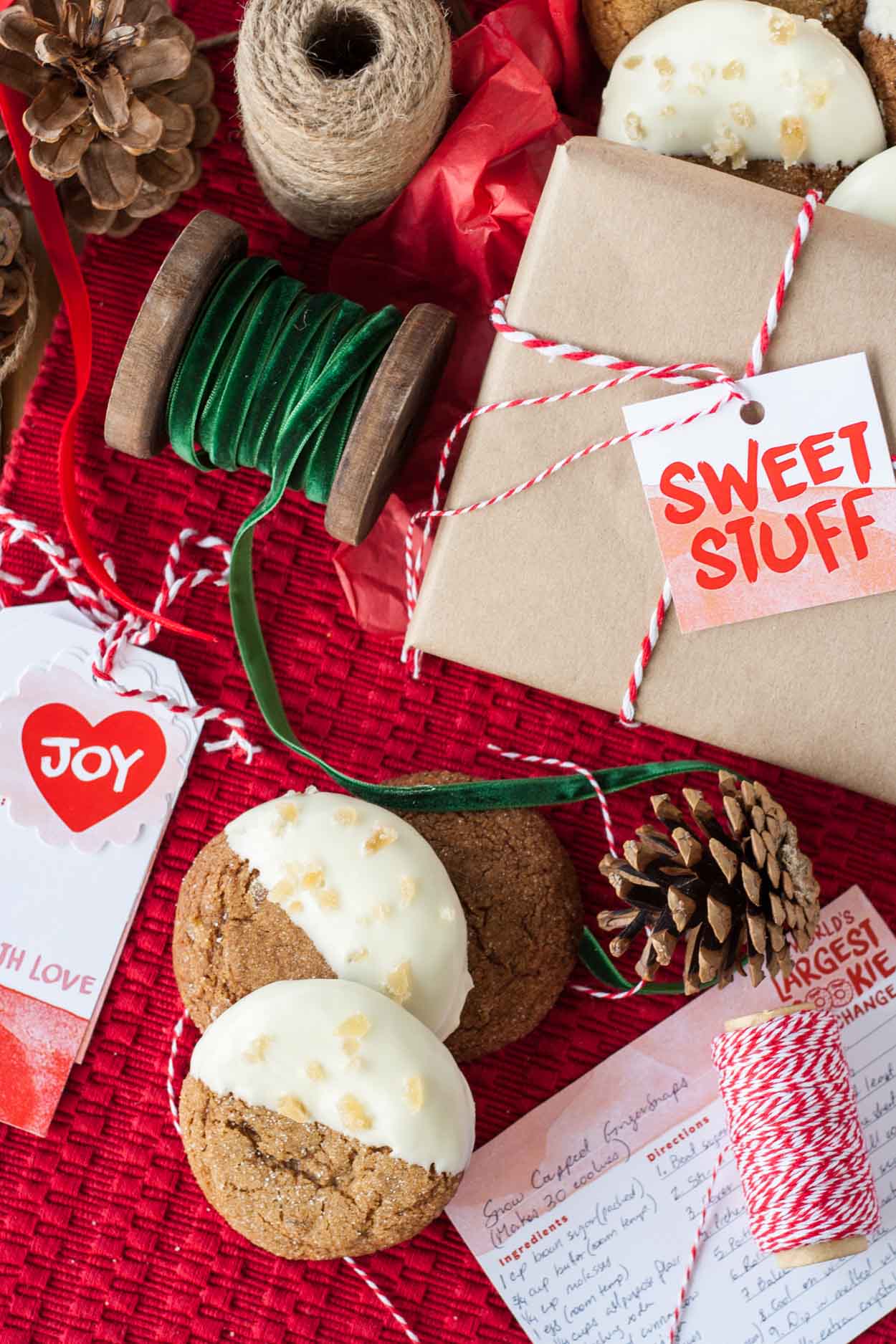 These Snow Capped Gingersnaps are the perfect Christmas cookies! Chewy gingerbread cookies dipped in white chocolate and topped with crystallized ginger. | livforcake.com White chocolate dipped chewy gingersnaps