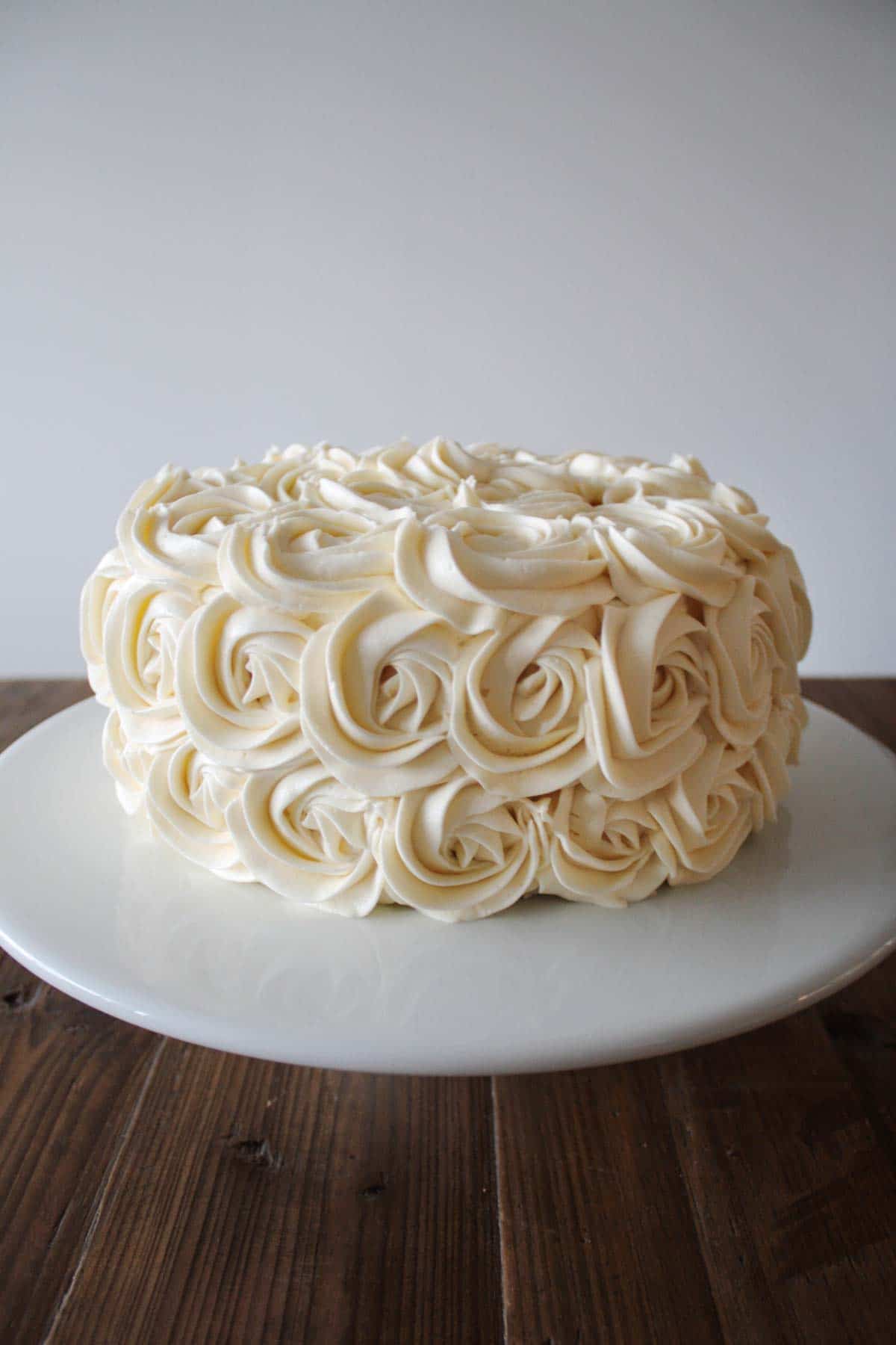 Cake frosted with rosettes and American buttercream
