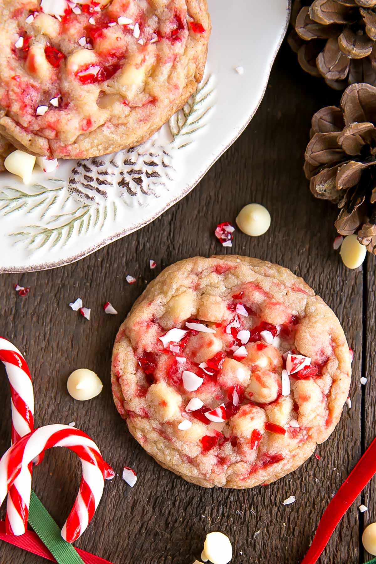 These White Chocolate Candy Cane Cookies are crispy, chewy and delicious. The perfect sweet treat for the holidays! | livforcake.com Overhead shot of White Chocolate Candy Cane Cookies